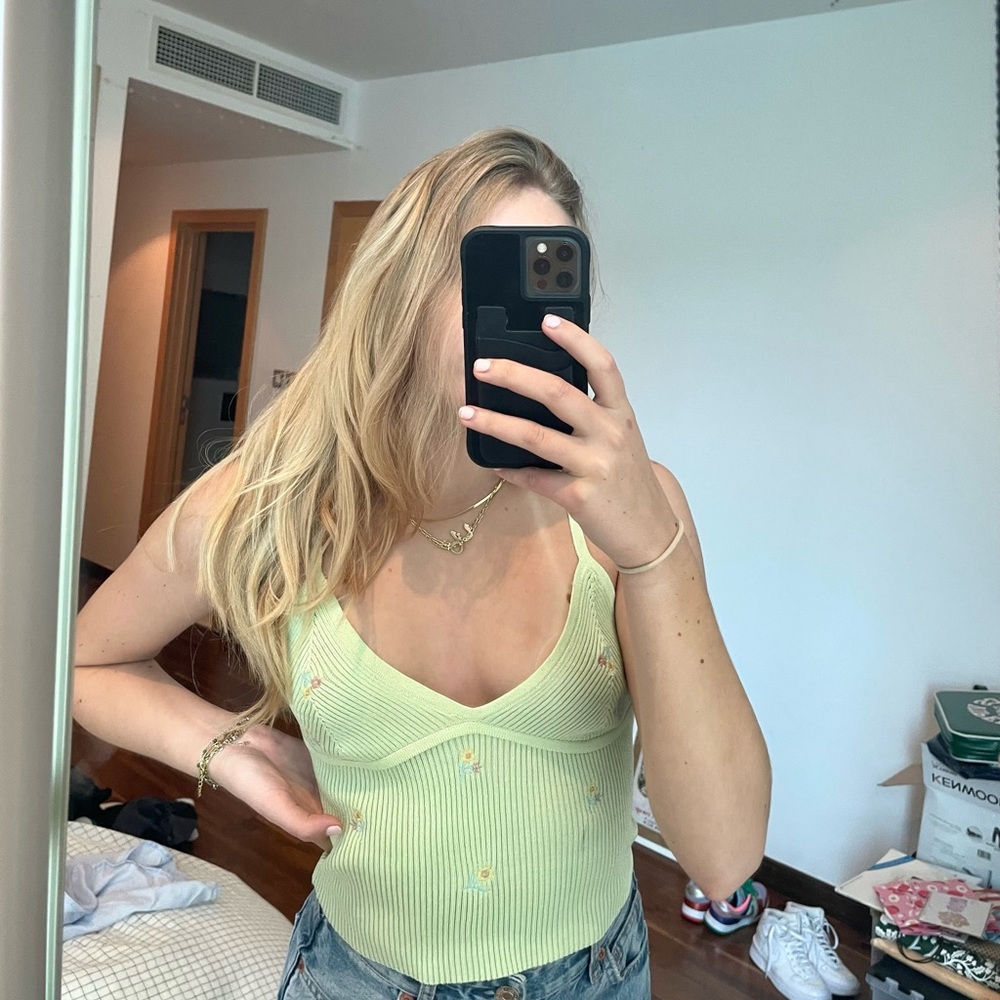 Light green ribbed tank top with little pink flowers